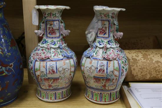 A 19th century Chinese blue ground dragon vase and a pair of famille rose vases tallest 36cm